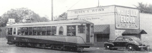 1gb. Black & Webb store with Streetcar at East Spring Street, 1946.jpg